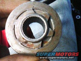 Close-up of a splined metal part with a SuperMotors.net watermark