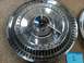 1965 Ford Thunderbird - A single hubcap for a 1965 Ford Thunderbird is shown, the model name embossed around the rim.