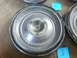 1965 Ford Thunderbird - This hubcap, likely from a 1965 Ford Thunderbird, features the model name embossed around the center.