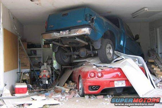 1999 Ford Ranger rear end on top of red Ferrari