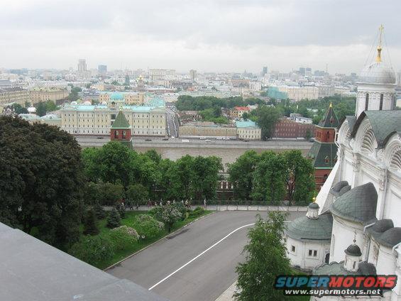 View of Moscow's Kremlin complex and river, with city skyline in background
