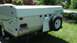2006 Yugo Vega - Viking pop-up camper trailer shown from the rear, with a spare tire mounted.