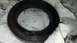 2006 Yugo Vega - This image shows a close-up view of a used automotive seal, likely a bearing seal, resting on a white cloth.