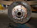 1992 Ford Bronco - This image shows the internal components of a vehicle's wheel hub and brake system.
