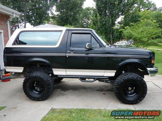 dscn0694.jpg from the side view...I finnaly was able to get the new Goodyear 35x12.5 MT/R w/kevlar mounted on 15x10 Procomp Stealies. I was also able to get my front end overhaul done and since i was up there i replaced the front shocks with Doetsch Prerunners, The back end all i did was take out the 3.5 inch blocks/Leaf Springs/shocks and replaced with 1.5 Blocks/ leaf springs from superlift and rear shocks with Doetsch Prerunner shocks. and for family accessibility some N-Fab side steps.