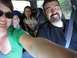 1992 Ford Explorer - A family smiles for a selfie while on a trip inside a vehicle.