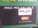 2003 Ford Crown Victoria - A gas pump display shows the price per gallon and an official seal from Illinois.