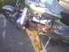 2003 Ford Crown Victoria - A custom motorcycle features intricate paintwork and a prominent turbocharger setup.
