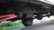 1993 Ford Bronco - Close-up of the undercarriage, highlighting the suspension and drivetrain components.