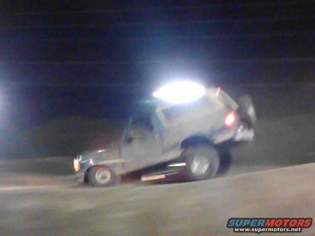 4.jpg Jumping my truck at Trucks on the Track back before I lifted it. Still drove fine