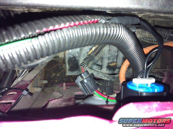 img_0551.jpg I decided my lights were too dim. I looked into the RJM harness, which looked like a GREAT product, but I couldn't afford it at the time. So I built my own. I had everything I needed except the headlight plugs which I got at Oreilly's for $10.

It uses the same coloring (almost) as the original harness, red for low beams, green for high beams, each of which have their own fuse. Ground is orange. It uses standard Ford relays so replacements will be plentiful.  It is all 12 gauge wire so current won't be too limited. There is a run of ~14 gauge that goes into each of the headlight connectors but they are only ~4 inches long.

No hacking of the factory wiring was done, so the harness can be removed like it was never even there.

The parts list includes:
Relays x2
12 gauge wire in 3 different colors
2 30 amp fuses
Heatshrink tubing
Solder
Varoius wire connectors
Zipties
1/2&quot; wire loom
2 headlight connectors

Here is how the circuit is wired:
[url=http://www.supermotors.net/registry/media/985236][img]http://www.supermotors.net/getfile/985236/thumbnail/relay_headlight_circuit_schematic.jpg[/img][/url]