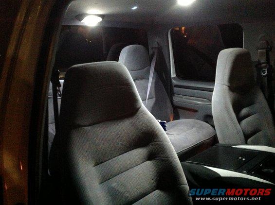 Interior view of 1997 Ford F-350 showing front seats and door panel