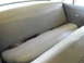 1963 Ford Fairlane - Interior view of the rear seat in a 1963 Ford Fairlane, showing the seat pattern and seatbelts.