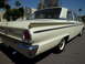 1963 Ford Fairlane - This vintage Ford sedan features a distinctive chrome bumper and a prominent round taillight.