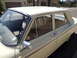1963 Ford Fairlane - This 1963 Ford Fairlane sedan is shown from a 3/4 front angle, highlighting its classic body style and cream exterior paint.
