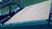 1986 Ford Bronco - Here the seat's folded up and the cover is snapped to the forward bow.