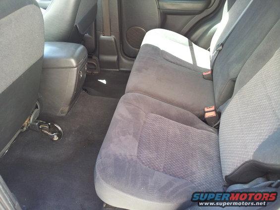 Rear seats and center console of a vehicle interior
