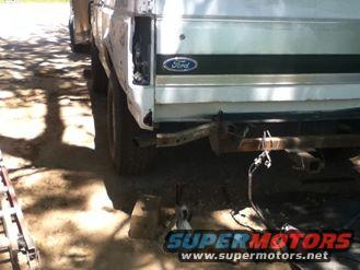 1996 Ford Bronco rear driver side quarter panel with Ford emblem on tailgate