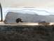 1996 Ford Bronco - This vehicle's body panel shows significant rust damage and repair work.