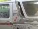 1996 Ford Bronco - Bodywork in progress on a 1996 Ford Bronco, showing primer and a red stripe detail.