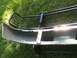 1996 Ford Bronco - A front bumper and brush guard are shown resting on grass, with the SuperMotors.net logo in the lower portion of the image.