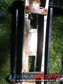1996 Ford Bronco front bumper assembly, rusty metal frame with mounting holes