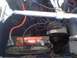 1964 Ford Ranchero - Close-up view of the engine bay, showing the battery and various engine components.