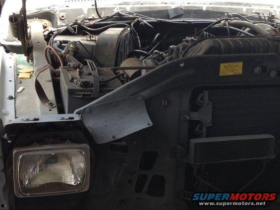 Engine bay and headlight of a disassembled truck