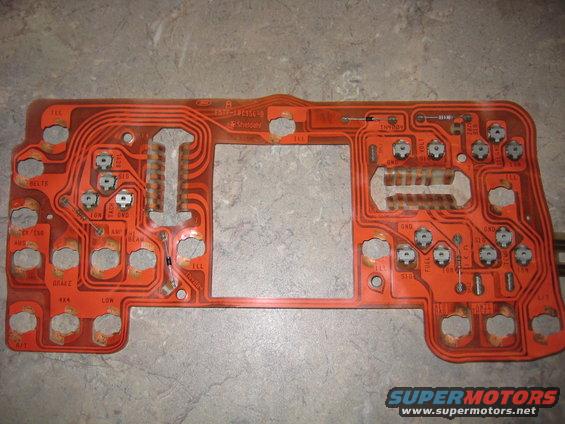 circuit board with various labels like 'FUEL', 'BRAKE', '4X4', 'LOW', 'IGN', 'BELT', 'OIL', 'TEMP', 'VOLT', 'GND', and 'ILL'