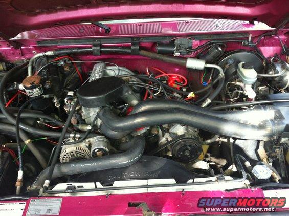 img_0980.jpg Used some HD Simplegreen and a pressure washer on low to blast the grime off the engine. Worked fairly will. HOWEVER, I will not be doing that again as It caused a no start condition that took unplugging, claning and drying ALL of the under hood connectors as well as the entire ignition system.