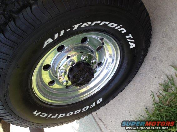 BFGoodrich All-Terrain T/A tire on a chrome wheel with a black hub