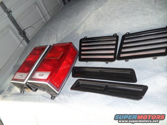 Pair of red taillights and black side marker lights