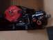 1994 Ford Bronco - A black power steering gearbox with a red cap and copper fittings is shown in a cardboard box.