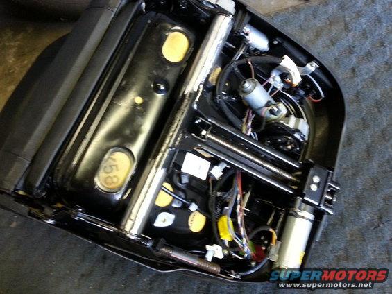 Power seat mechanism with motors and wiring