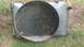 1983 Ford F-250 - Radiator and fan shroud assembly, likely for a truck, with debris on the fins.