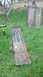 1983 Ford F-250 - A rusted metal part is shown lying on the grass outdoors.