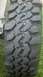 1983 Ford F-250 - A close-up view of a tire tread pattern is shown, with some text visible on the sidewall.