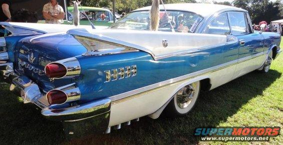 1959 Dodge Custom Royal two-tone blue and white, rear quarter view showing fins and chrome trim