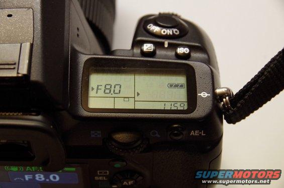 Camera LCD screen showing F8.0 aperture and battery level