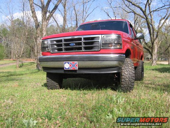 Red 1992 Ford Bronco front view with Confederate flag license plate