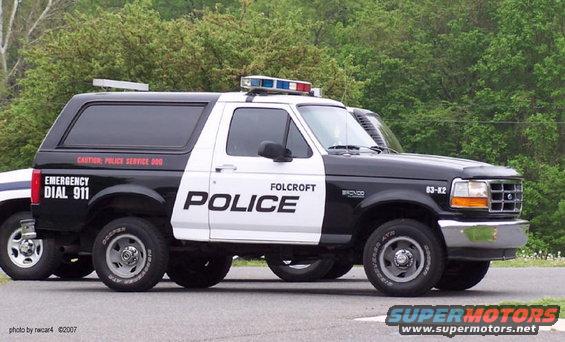 Folcroft police Bronco SUV with light bar, parked next to another vehicle