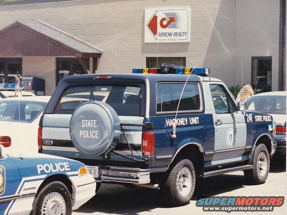 1992 Ford Bronco State Police vehicle with 'HACKNEY UNIT' text and 'STATE POLICE' on spare tire cover