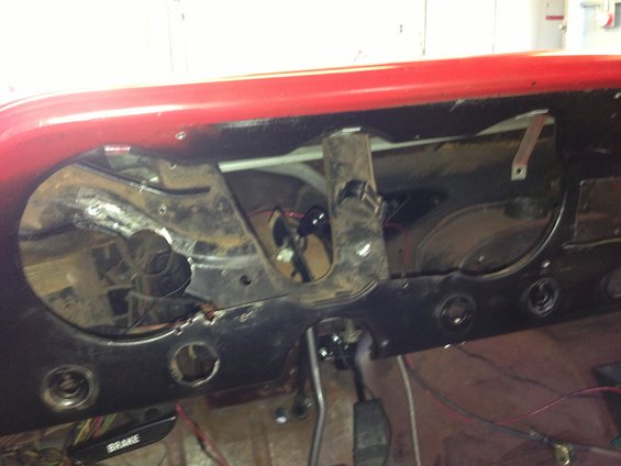 1964 Ford Fairlane dashboard with exposed wiring and missing gauges