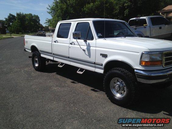White 1997 Ford F-350 crew cab pickup truck, 3q-front view