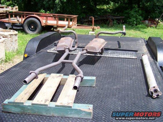 Dual exhaust system and driveshaft on a trailer