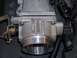 1999 Mercury Grand Marquis - This is a close-up view of a BBK Power-Plus throttle body, showing its specifications and part number.