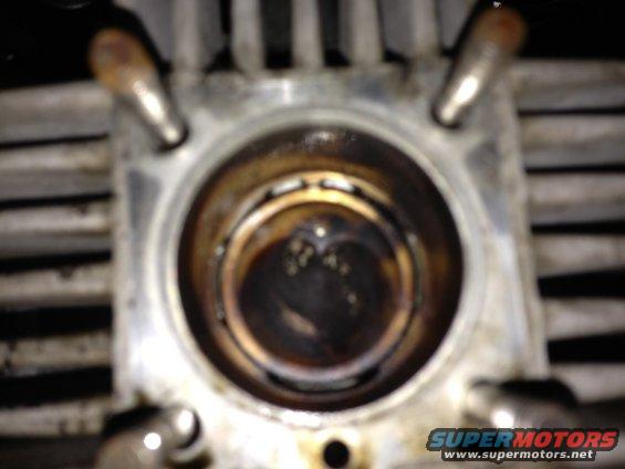 Close-up of an engine cylinder with a piston inside