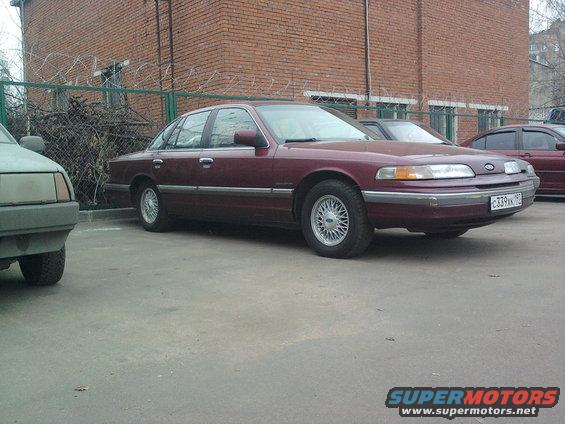 Maroon 1992 Ford Crown Victoria parked on a lot