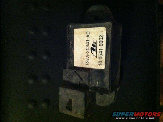 Black automotive sensor with a white label showing "F37A-2C341-AD" and "ATE 10.0541-9002.1"
