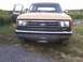 1991 Ford Bronco - This Ford truck features a prominent grille and headlights, with a '4x4' badge visible on the fender.